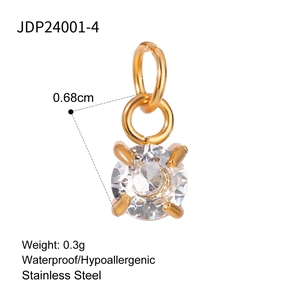 Macro shot of gold stainless steel pendant with zircon inlay and 0.68cm ring diameter
