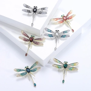 Set of six colorful rhinestone dragonfly brooches with enamel wings and gold silver bases