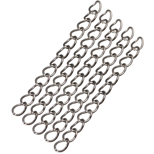 Detail of silver twisted metal extender chains for DIY jewelry making on white background