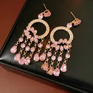 French court style tassel earrings with pink zircons and gold drops on leather box