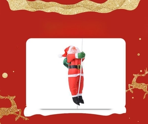Climbing Santa Claus plush doll on white rope for festive indoor holiday decoration