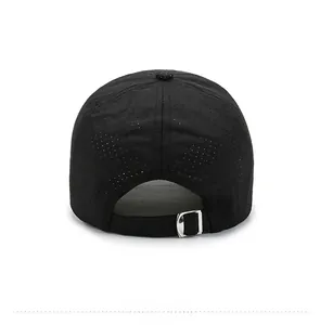 Detail of black mesh baseball cap showing breathable holes and silver metal buckle
