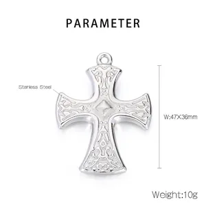 Detail view of a 47x36mm stainless steel cross pendant with baroque relief patterns