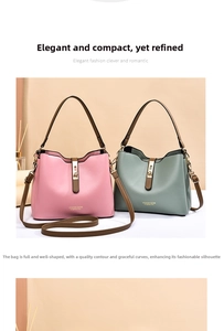 Detail of pink and green bucket bags featuring adjustable brown straps and gold hardware