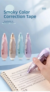 Detail of retractable correction tape showing 6m PET film and ergonomic grip design