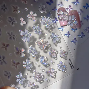 Detailed 3D aurora floral nail stickers with translucent jelly texture and butterfly motifs