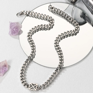Silver titanium steel Cuban chain necklace with square cross pendant on a mirror base