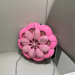 Pink flower shaped evening bag with sequins and diamonds showing 20x20x5cm dimensions