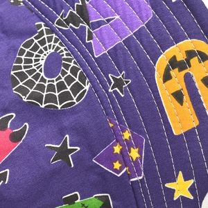 Double-sided Halloween bucket hat with purple fabric and spider web letter print
