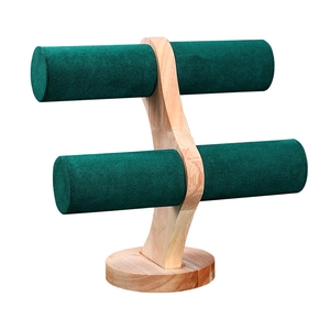 Dual-tier wooden jewelry display stand with dark green velvet cylinders for watches