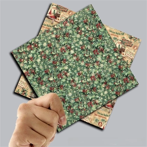 Detail of vintage Christmas scrapbook paper featuring Letters to Santa and holly patterns