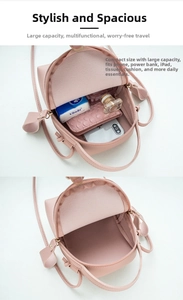 Detail showing high-capacity interior of pink mini crossbody bag with phone and perfume