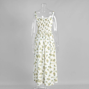 Detail of smocked elastic back on white summer dress featuring yellow lemon prints