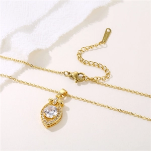 Golden stainless steel bowknot teardrop necklace with micro-pave cubic zirconia crystals