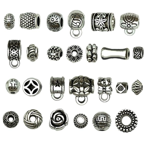 Collection of vintage silver-plated spacer beads and pendants for DIY jewelry crafting
