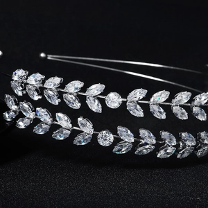 Macro detail of silver leaf headband with sparkling marquise-cut cubic zirconia crystals