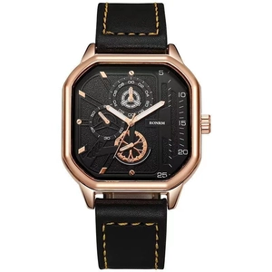 Square sports watch with black leather strap and gold case showing complex dial