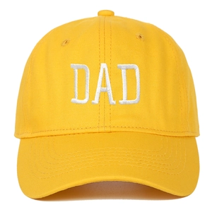 Detailed view of the yellow cotton baseball cap with white DAD embroidery and fine stitching
