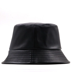 Chic black faux leather bucket hat with detailed brim stitching on a clean white background
