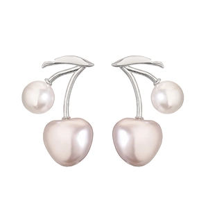 Detail view of elegant copper cherry stud earrings with pink shell pearls and silver leaves