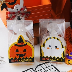Self-adhesive Halloween pumpkin and ghost treat bags with paper inserts for cookies