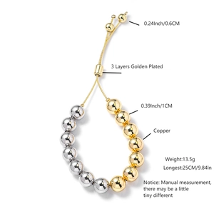Detail of adjustable copper beaded bracelet with 0.6cm and 1cm gold-silver metal beads