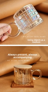 Detailed view of textured amber glassware with wooden lid and metallic stirring spoon