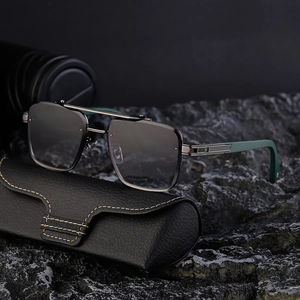 Square frame metal sunglasses with gray gradient lenses and a black leather case