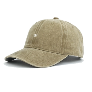 Detailed view of vintage washed cotton baseball cap texture with white round embroidery