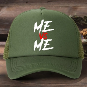 Detail view of military green trucker hat with breathable mesh and ME VS ME print