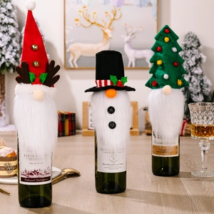 Three festive Christmas wine bottle covers featuring reindeer antlers and gnome hat designs