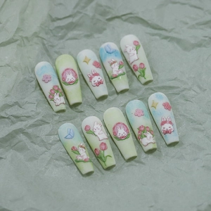 Pastel green and white gradient press-on nails with rabbit and tulip floral relief