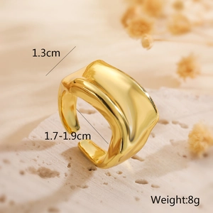 Macro shot of gold lava-textured open ring with dimensions 1.3cm width and 8g weight
