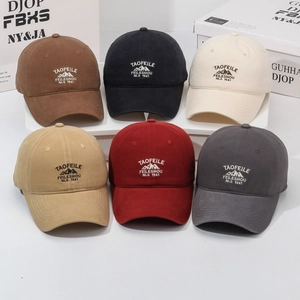 Collection of vintage washed cotton baseball caps in six colors with embroidered logos