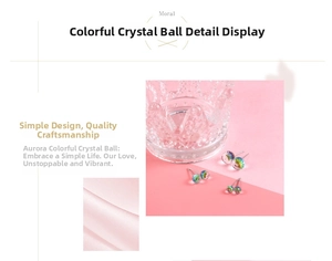 Macro shot of iridescent crystal ball earrings with aurora coating in multiple sizes