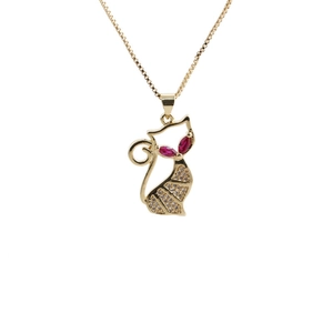 Golden cat pendant necklace with red gemstone eyes and diamonds on white background