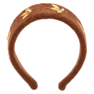 Vintage brown velvet leaf headband with elegant pearls for a high-volume hairstyle look