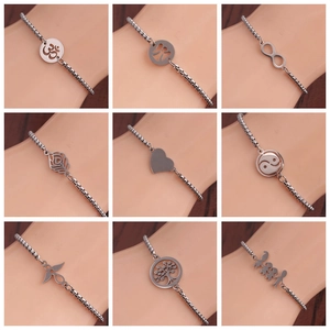 Polished stainless steel charm bracelets for women with various spiritual and symbolic pendants
