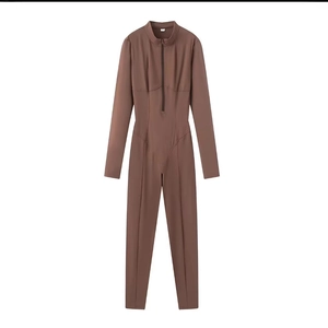 Brown long sleeve slim-fit jumpsuit with front zipper and stand collar design