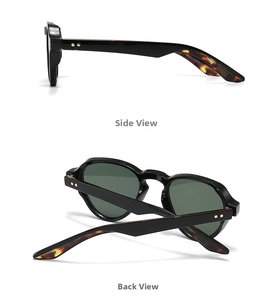 Detail view of retro round sunglasses with black frames and tortoise pattern inner temples