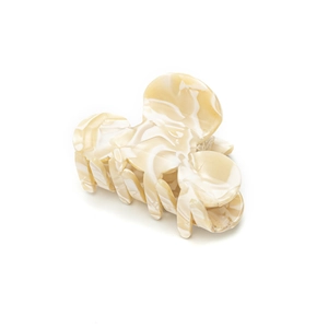 Elegant cream marble acetate shark hair claw clip for women in a minimalist style