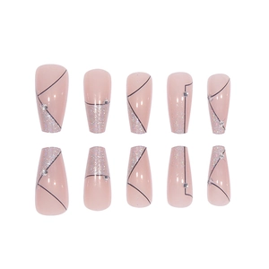 Long coffin press-on nails with nude pink base, black geometric lines and silver glitter