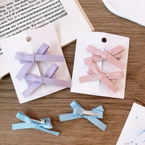 Pink and purple satin ribbon bow hair clips set for balletcore aesthetic hairstyles