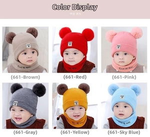 Detail of baby winter knit hat set with double faux fur pom-poms in six vibrant colors