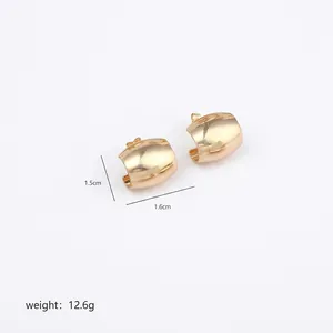 Detailed view of irregular polished gold hoop earrings with 1.5cm height and 1.6cm width