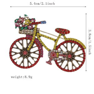 Detailed size view of vintage bicycle brooch with colorful rhinestones, 5.4cm by 3.8cm