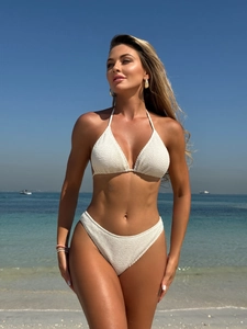 Chic white waffle textured bikini set with halter triangle top for beach vacation
