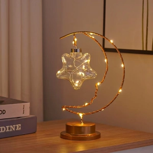 Warm LED crescent moon and star iron desk lamp with bronze metal frame and round base