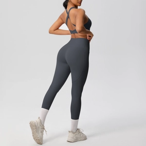Back view of high-waist yoga set showing seamless contouring fabric and racerback bra