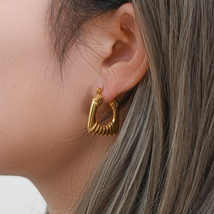 Golden geometric hollow square hoop earrings in vintage 18k plated stainless steel